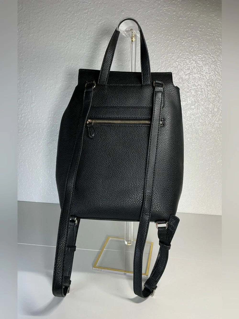 GUESS Black Pebbled Leather Drawstring Backpack with Gold Hardware